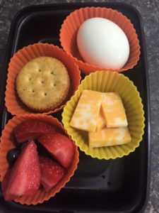 Hardboiled egg Block cheese Berries Whole Wheat Crackers